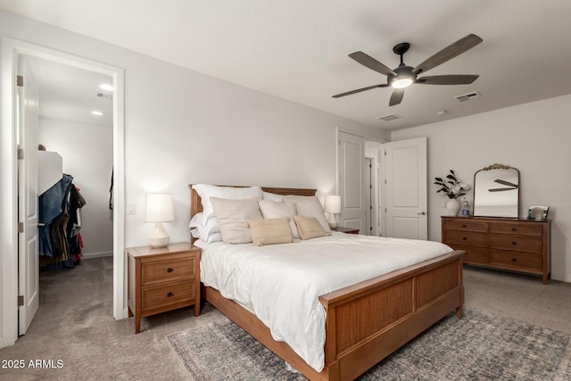 5460 S Dillon Cir, Mesa, AZ 85212 - bedroom featuring light colored carpet, a ceiling fan, a spacious closet, and baseboards