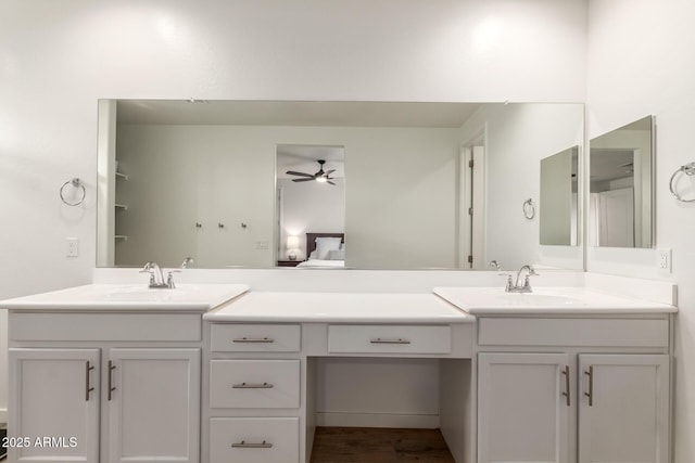 5460 S Dillon Cir, Mesa, AZ 85212 - bathroom with a ceiling fan and double vanity
