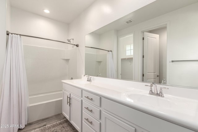 5460 S Dillon Cir, Mesa, AZ 85212 - bathroom with shower / bath combo with shower curtain, double vanity, wood finished floors, and recessed lighting