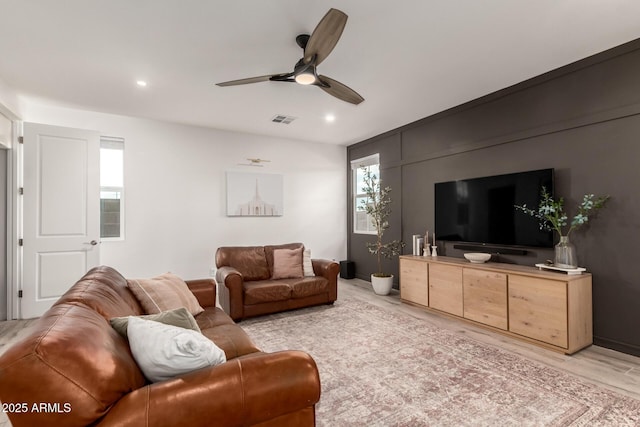 5460 S Dillon Cir, Mesa, AZ 85212 - living room featuring a ceiling fan, recessed lighting, and light wood-type flooring