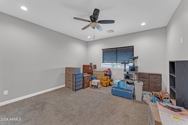 playroom featuring carpet floors and ceiling fan