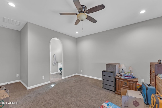 miscellaneous room with light carpet and ceiling fan