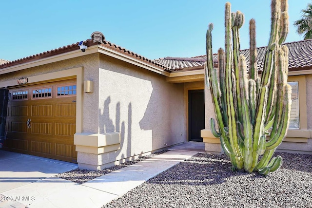 property entrance featuring a garage