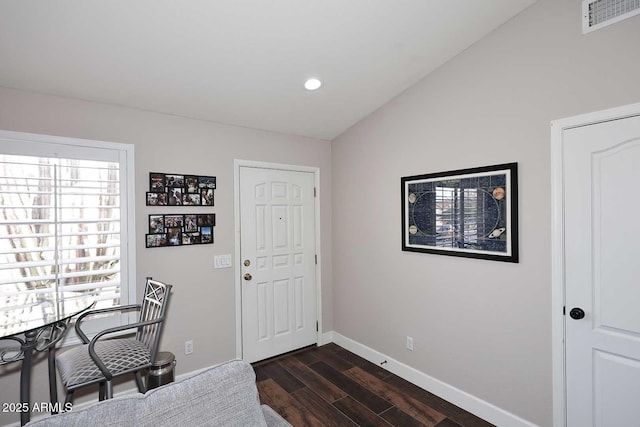 office space with dark wood-type flooring