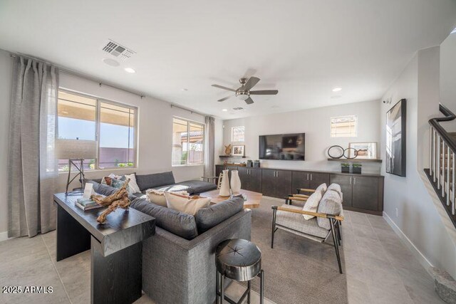 12233 W Caraveo Pl, Peoria, AZ 85383 - living area with stairway, ceiling fan, recessed lighting, baseboards, and light tile patterned floors
