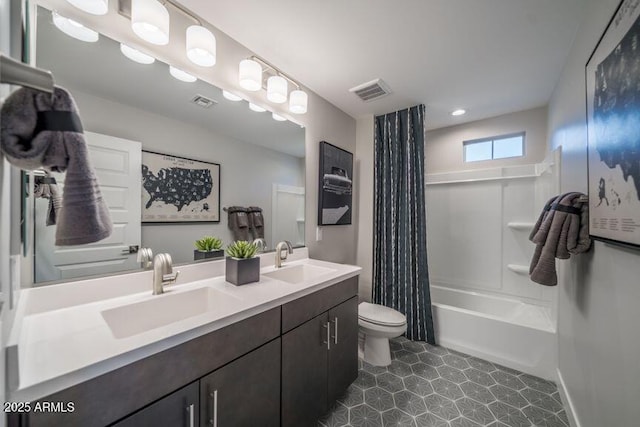 12233 W Caraveo Pl, Peoria, AZ 85383 - bathroom with toilet, double vanity, and shower / tub combo with curtain