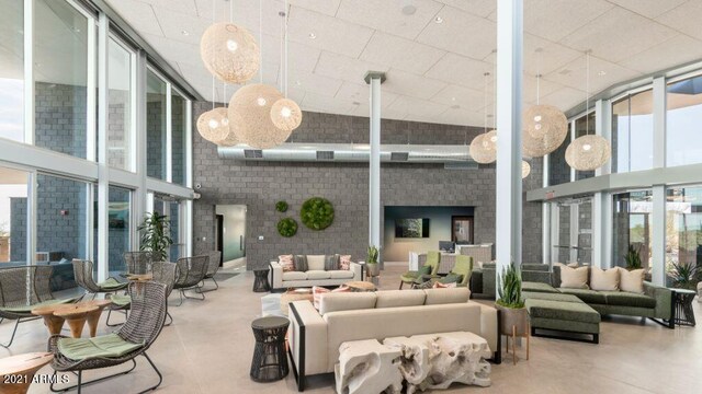 12233 W Caraveo Pl, Peoria, AZ 85383 - building lobby featuring floor to ceiling windows and a high ceiling