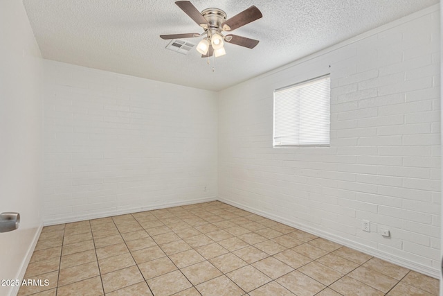 3128 W Pima St Unit 2, Phoenix, AZ 85009 - empty room with a textured ceiling and ceiling fan