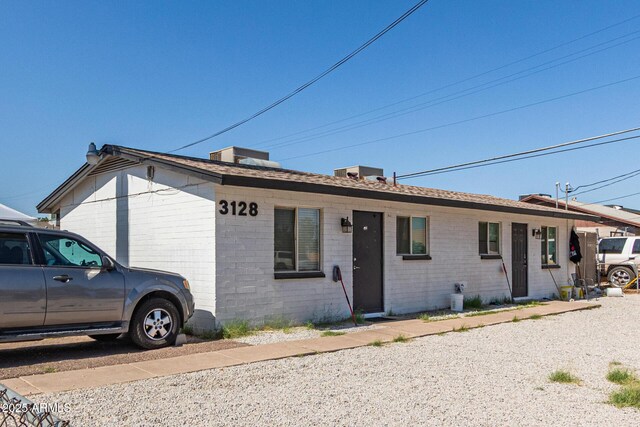 3128 W Pima St Unit 2, Phoenix, AZ 85009 - ranch-style home featuring brick siding