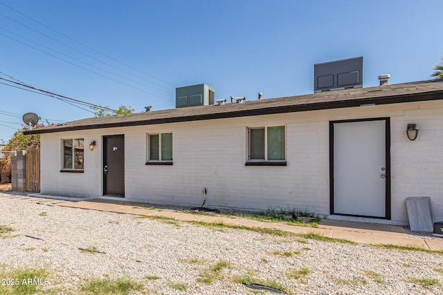 3128 W Pima St Unit 2, Phoenix, AZ 85009 - rear view of house with brick siding