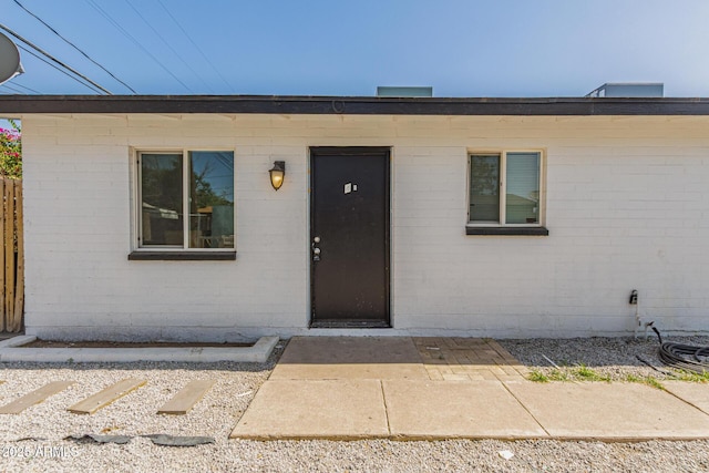 3128 W Pima St Unit 2, Phoenix, AZ 85009 - property entrance featuring a patio area and brick siding