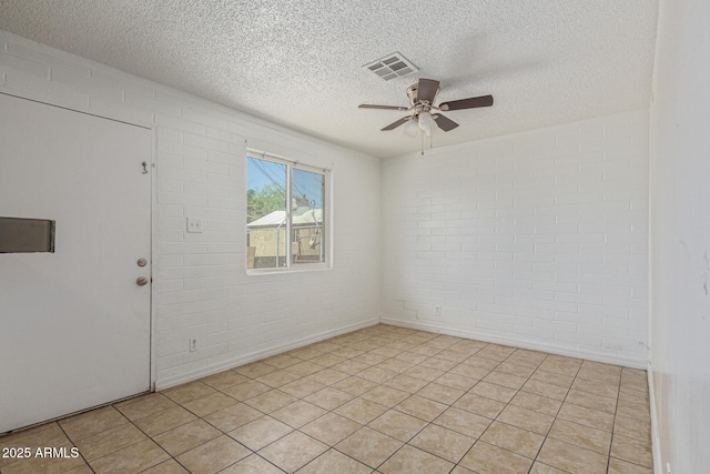 3128 W Pima St Unit 2, Phoenix, AZ 85009 - spare room with a ceiling fan and a textured ceiling