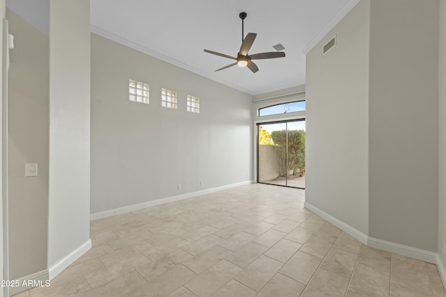 spare room with crown molding and ceiling fan