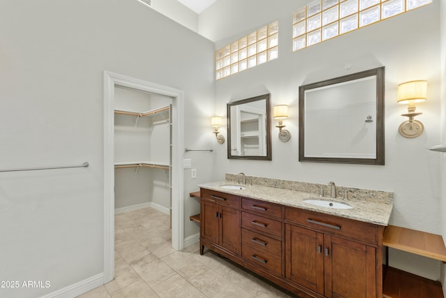 bathroom featuring vanity and tile patterned flooring