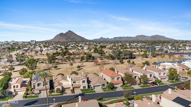 birds eye view of property featuring a mountain view