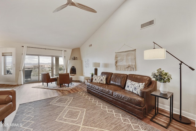 15857 E Ponderosa Dr, Fountain Hills, AZ 85268 - living area featuring high vaulted ceiling, wood finished floors, a ceiling fan, and baseboards