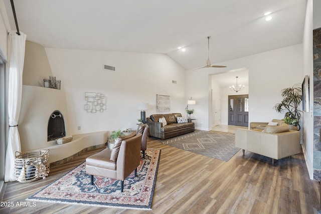 15857 E Ponderosa Dr, Fountain Hills, AZ 85268 - living area featuring wood finished floors, a ceiling fan, high vaulted ceiling, a chandelier, and recessed lighting