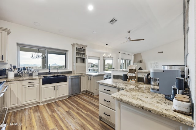 15857 E Ponderosa Dr, Fountain Hills, AZ 85268 - kitchen with stainless steel appliances, a sink, a ceiling fan, vaulted ceiling, and light wood finished floors