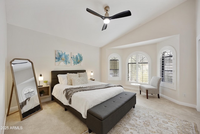 15857 E Ponderosa Dr, Fountain Hills, AZ 85268 - bedroom featuring light colored carpet, multiple windows, lofted ceiling, baseboards, and a ceiling fan