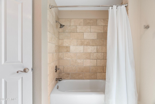 bathroom with shower / tub combo