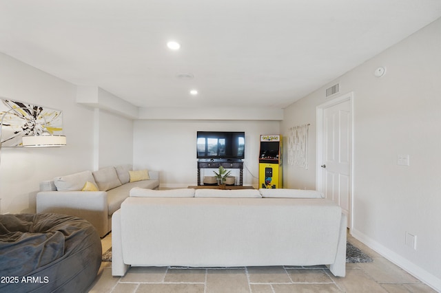 15857 E Ponderosa Dr, Fountain Hills, AZ 85268 - living room featuring baseboards, recessed lighting, and light stone finish flooring