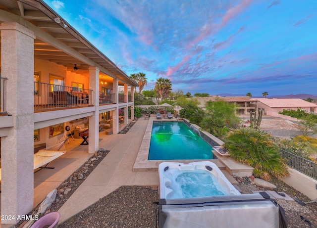 15857 E Ponderosa Dr, Fountain Hills, AZ 85268 - view of swimming pool featuring an outdoor hot tub, a patio, and fence