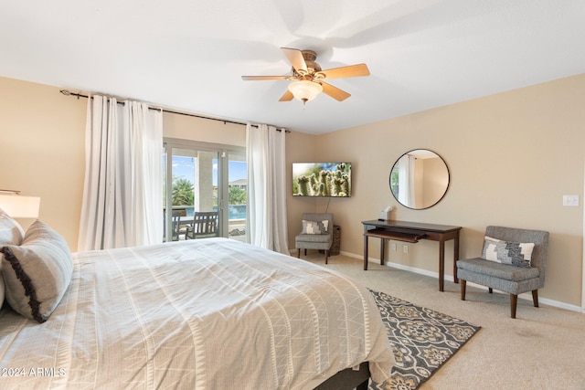 bedroom with light colored carpet, ceiling fan, and access to outside