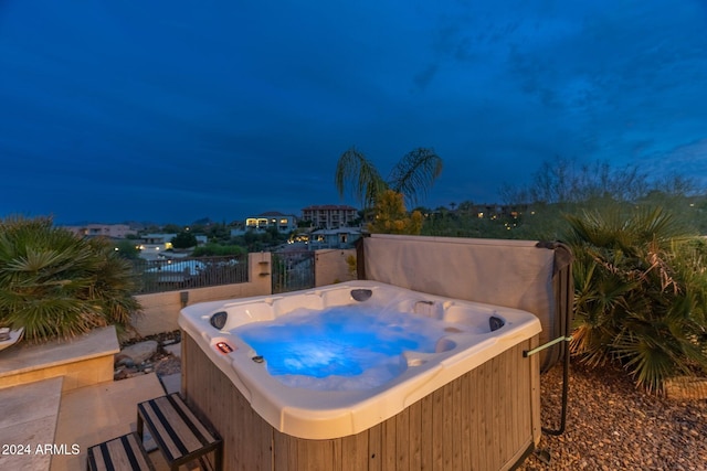 15857 E Ponderosa Dr, Fountain Hills, AZ 85268 - pool at twilight with a hot tub and fence