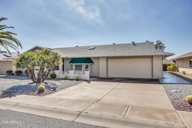 ranch-style home with a garage