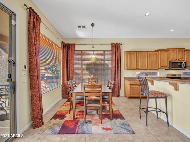 dining room featuring light tile patterned floors