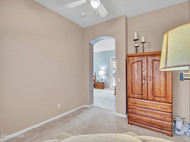 interior space featuring ceiling fan