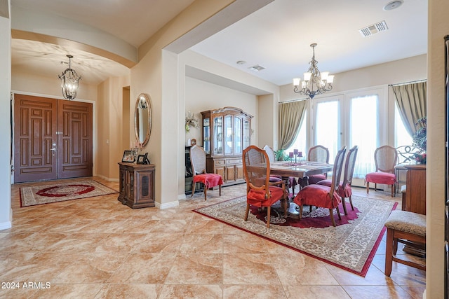 dining space featuring a chandelier