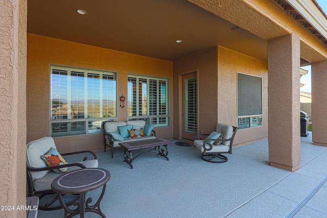 view of patio / terrace with an outdoor hangout area and a grill