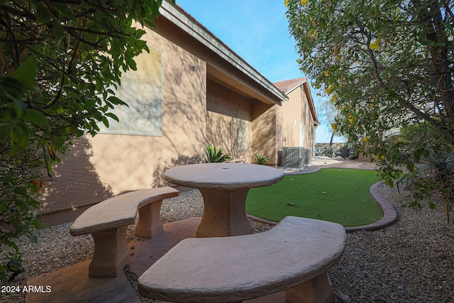 view of yard featuring central AC