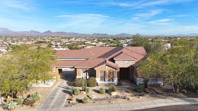 view of front of house with a mountain view