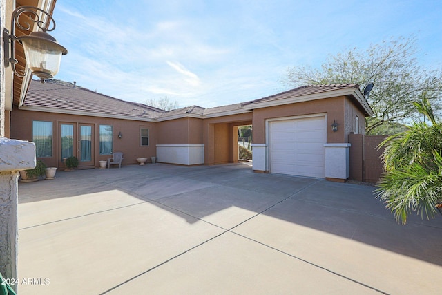 view of front of property with a garage