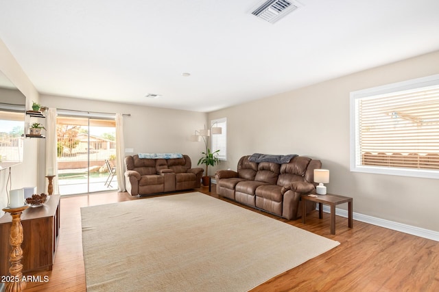 living room with hardwood / wood-style flooring