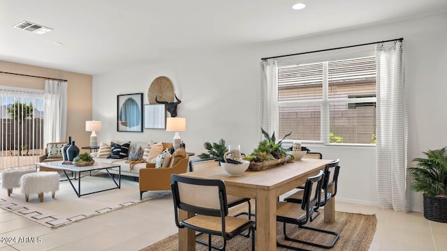 dining area featuring light tile patterned floors, visible vents, and recessed lighting