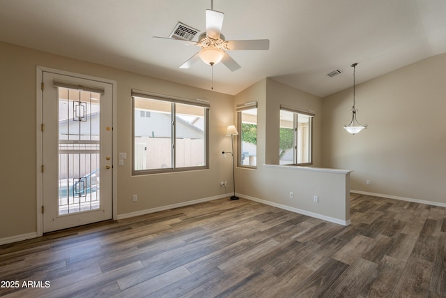 1555 E Monterey St, Chandler, AZ 85225 - spare room with lofted ceiling, wood finished floors, ceiling fan, and baseboards