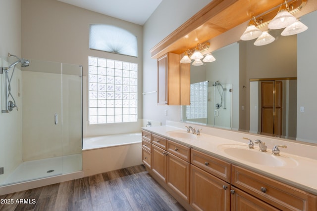 1555 E Monterey St, Chandler, AZ 85225 - bathroom with a shower stall, a bath, double vanity, and wood finished floors
