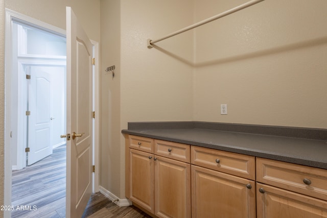 1555 E Monterey St, Chandler, AZ 85225 - laundry room featuring wood finished floors and baseboards