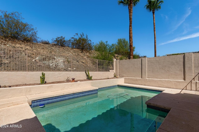 view of pool with a fenced in pool and a fenced backyard