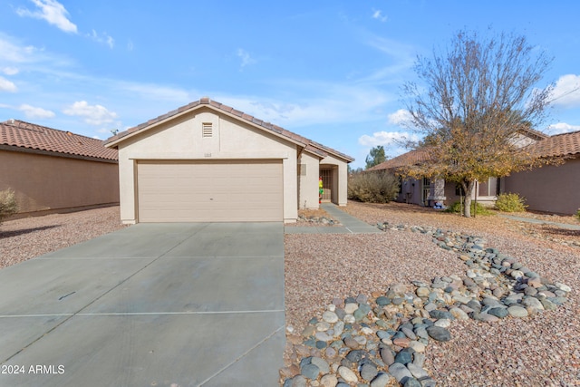 view of front of property with a garage