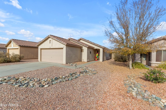 view of front of home with a garage