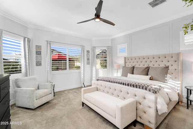 bedroom featuring light carpet, visible vents, crown molding, and a ceiling fan