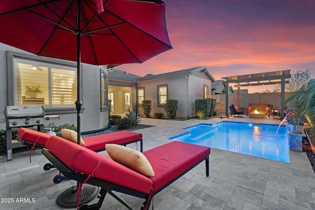 view of pool with a fenced in pool, outdoor lounge area, a patio area, a grill, and a pergola