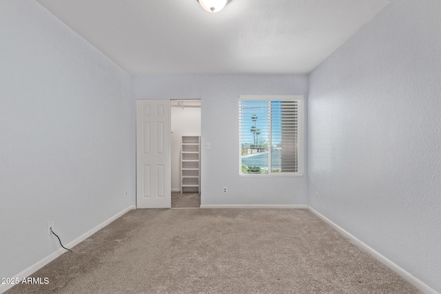 747 S Extension Rd Unit 113, Mesa, AZ 85210 - carpeted empty room with baseboards