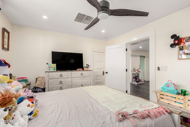 bedroom featuring recessed lighting, wood finished floors, visible vents, and ceiling fan