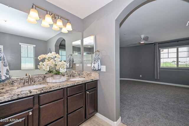 6611 S San Jacinto St, Gilbert, AZ 85298 - full bath featuring healthy amount of natural light, double vanity, a shower with shower door, and baseboards