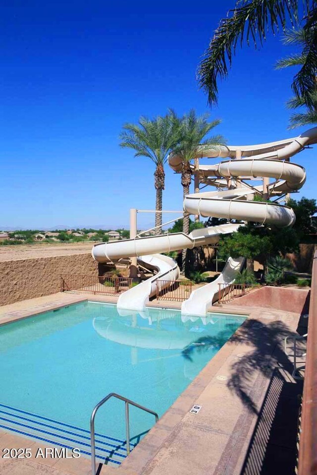 6611 S San Jacinto St, Gilbert, AZ 85298 - view of swimming pool with a water slide